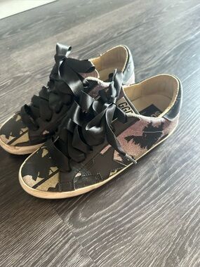 Light purple / green golden goose sneakers.